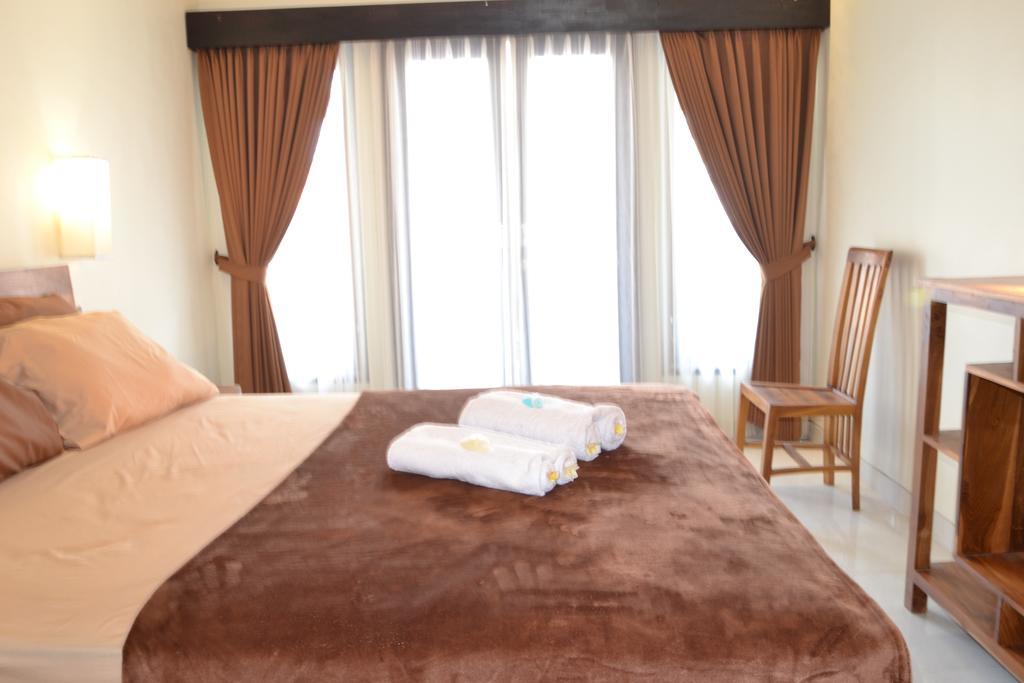 Pujihouse One Apartment Легиан Стая снимка
